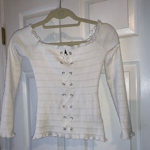 White long sleeve off the shoulder shirt